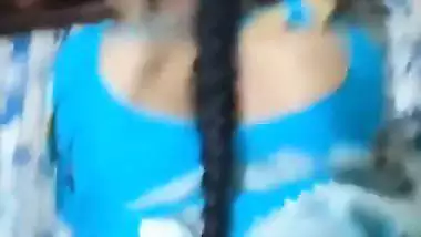 Desi chudai of Bhabhi lying on bed in blue saree