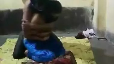 Half-naked young Indian woman allows man to come and touch XXX tits